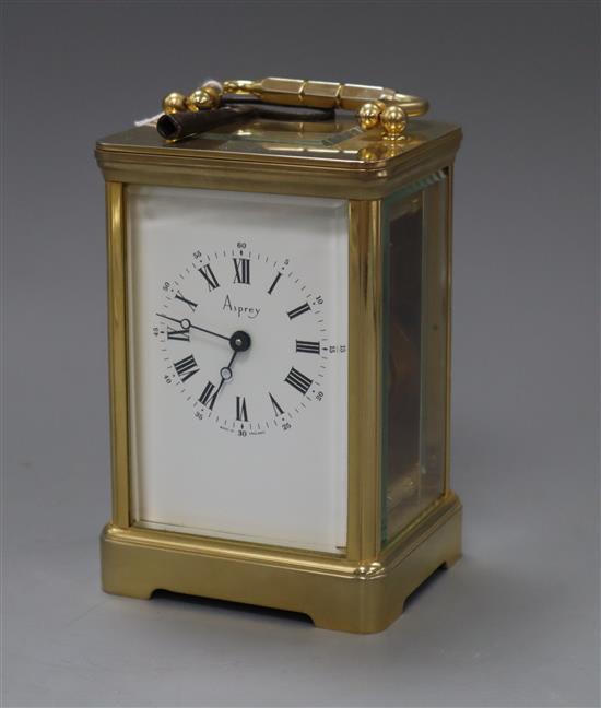 An Asprey brass cased carriage timepiece